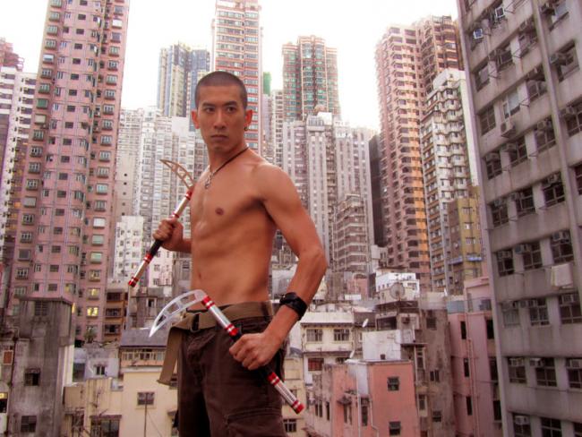 Kama pose on Hong Kong rooftop